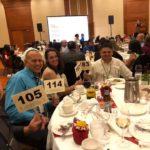 Gala Attendees with their bids paddles