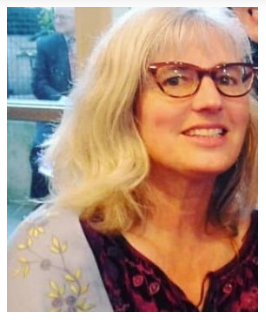 Professor Kristyn Joy smiling at camera